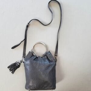 Arms of Eve Society Leather Souch Crossbody Bag Metallic Round Handles Tassels‎